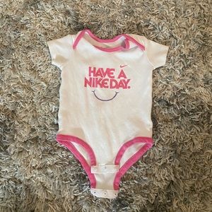 NIKE baby onesie